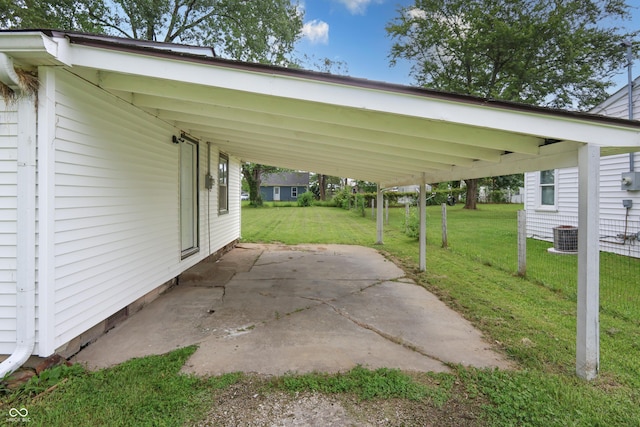 523 Patterson Rd, Columbus, IN 47203 - view of patio / terrace featuring a carport