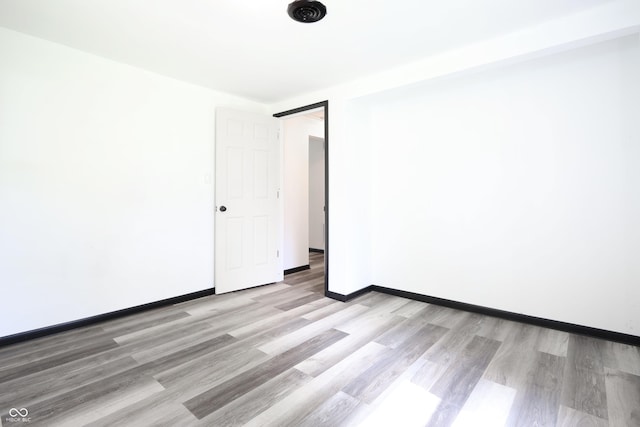 523 Patterson Rd, Columbus, IN 47203 - empty room featuring light wood finished floors and baseboards