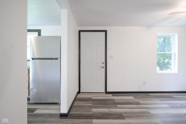 523 Patterson Rd, Columbus, IN 47203 - kitchen with freestanding refrigerator, wood finished floors, and a ceiling fan