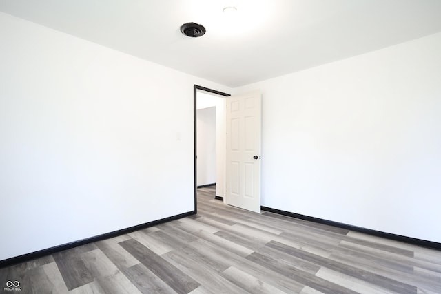 523 Patterson Rd, Columbus, IN 47203 - empty room featuring light wood finished floors and baseboards