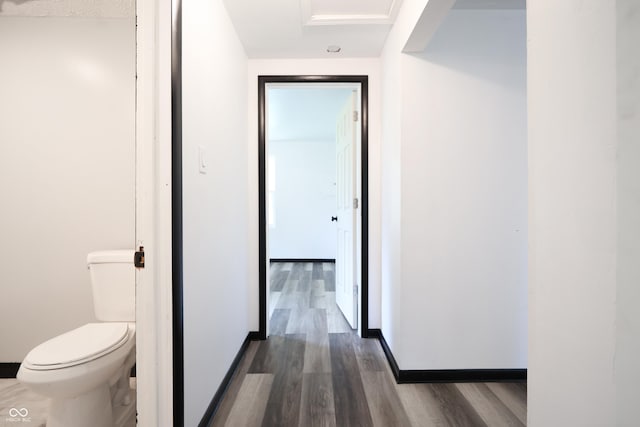 523 Patterson Rd, Columbus, IN 47203 - hallway with dark wood-style floors and baseboards