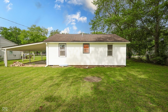 523 Patterson Rd, Columbus, IN 47203 - back of house with a yard