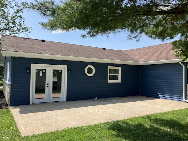 321 S 23rd St, Elwood, IN 46036 - rear view of property with roof with shingles, a patio area, and french doors