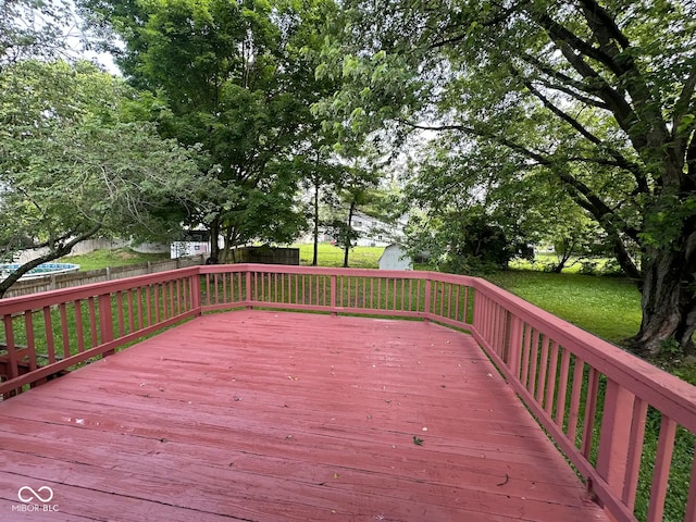 10316 Woodhaven Cir, Indianapolis, IN 46229 - wooden deck with a storage shed and a fenced backyard
