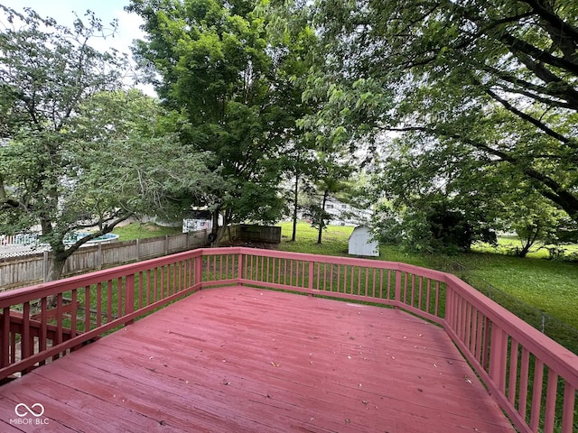 10316 Woodhaven Cir, Indianapolis, IN 46229 - wooden deck with a storage shed and a fenced backyard