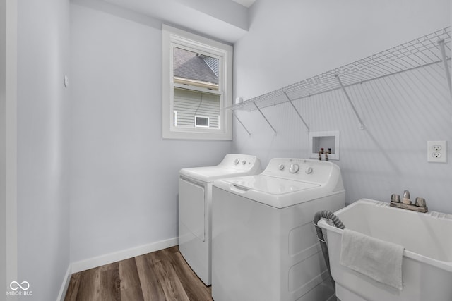 3035 Guilford Ave, Indianapolis, IN 46205 - washroom featuring washing machine and dryer and wood finished floors
