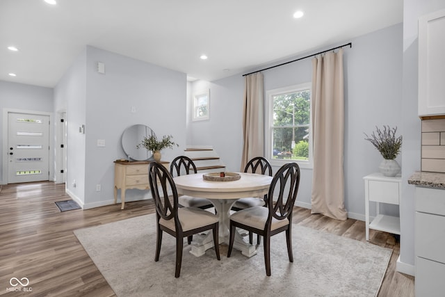 3035 Guilford Ave, Indianapolis, IN 46205 - dining area with recessed lighting, stairway, and light wood finished floors