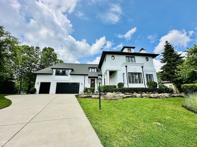 12208 Island Dr, Indianapolis, IN 46256 - view of front of house with stucco siding, concrete driveway, an attached garage, a front yard, and a chimney