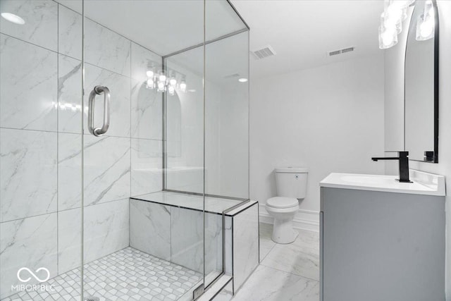 12208 Island Dr, Indianapolis, IN 46256 - bathroom featuring vanity, a marble finish shower, and marble finish floors