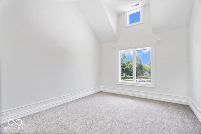 12208 Island Dr, Indianapolis, IN 46256 - carpeted empty room featuring baseboards and a high ceiling