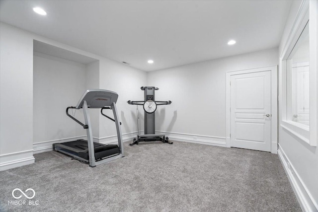 12208 Island Dr, Indianapolis, IN 46256 - workout room with carpet floors and recessed lighting