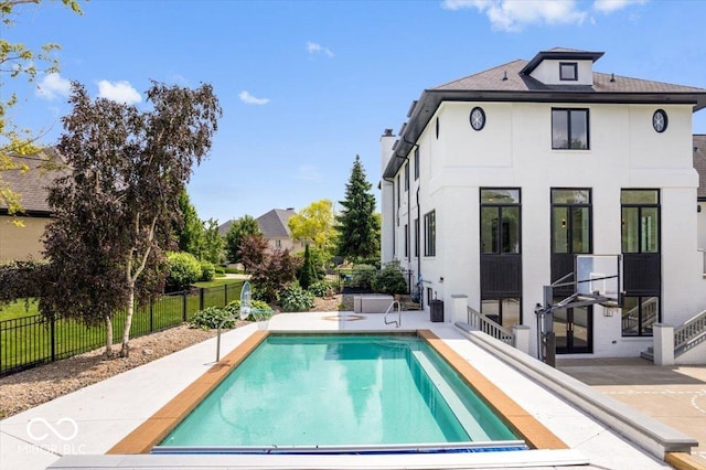 12208 Island Dr, Indianapolis, IN 46256 - view of pool with a patio and a fenced backyard