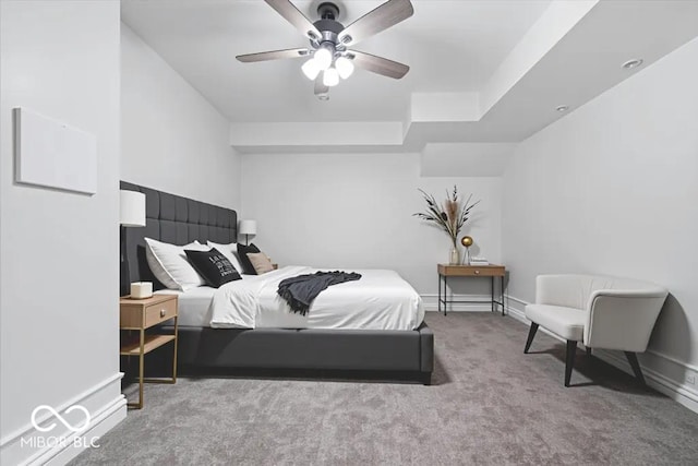 12208 Island Dr, Indianapolis, IN 46256 - carpeted bedroom with a ceiling fan and baseboards