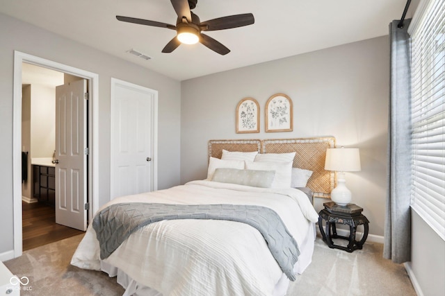 14453 Glapthorn Rd, Fishers, IN 46037 - carpeted bedroom with baseboards and a ceiling fan