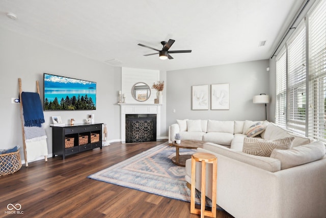 14453 Glapthorn Rd, Fishers, IN 46037 - living area with a ceiling fan, wood finished floors, and a fireplace