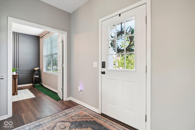 14453 Glapthorn Rd, Fishers, IN 46037 - foyer featuring dark wood-style floors and baseboards