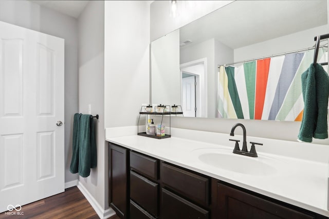 14453 Glapthorn Rd, Fishers, IN 46037 - full bath with vanity, wood finished floors, and a shower with shower curtain