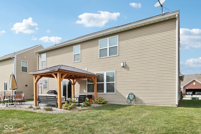 14453 Glapthorn Rd, Fishers, IN 46037 - back of property with a gazebo, a patio area, and a yard
