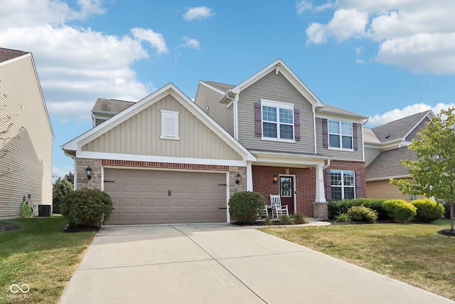 14453 Glapthorn Rd, Fishers, IN 46037 - craftsman inspired home with a front yard, concrete driveway, brick siding, a garage, and board and batten siding