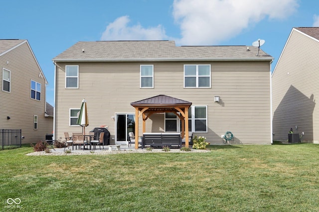 14453 Glapthorn Rd, Fishers, IN 46037 - back of property with a gazebo, a patio area, a lawn, and a hot tub
