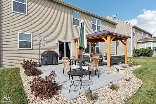 14453 Glapthorn Rd, Fishers, IN 46037 - back of house featuring a gazebo, a patio, and a lawn