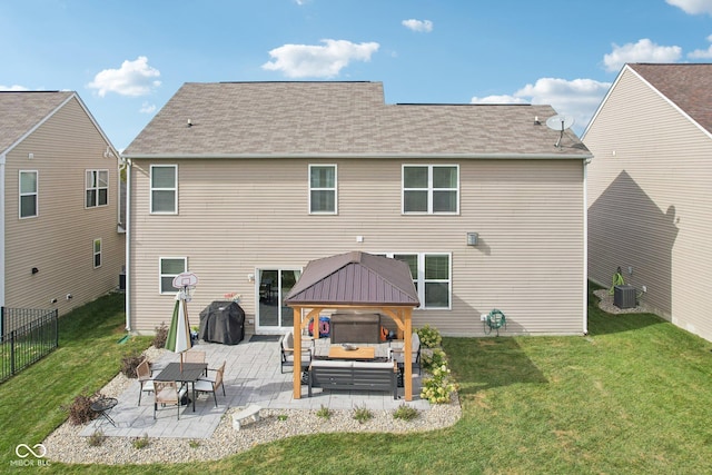 14453 Glapthorn Rd, Fishers, IN 46037 - back of property with a gazebo, an outdoor living space, and a patio