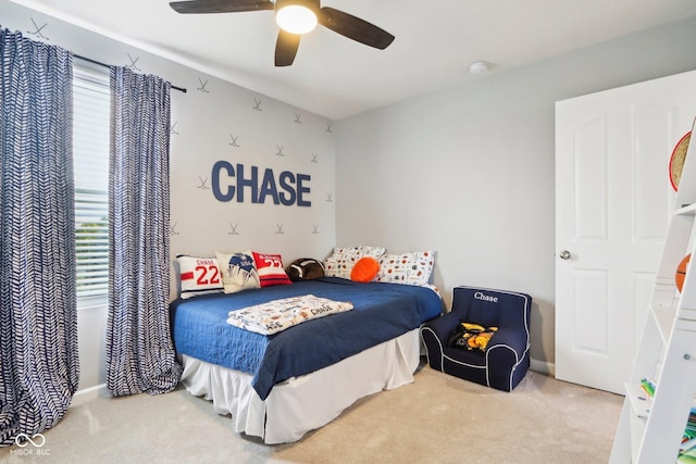 14453 Glapthorn Rd, Fishers, IN 46037 - carpeted bedroom with a ceiling fan and baseboards