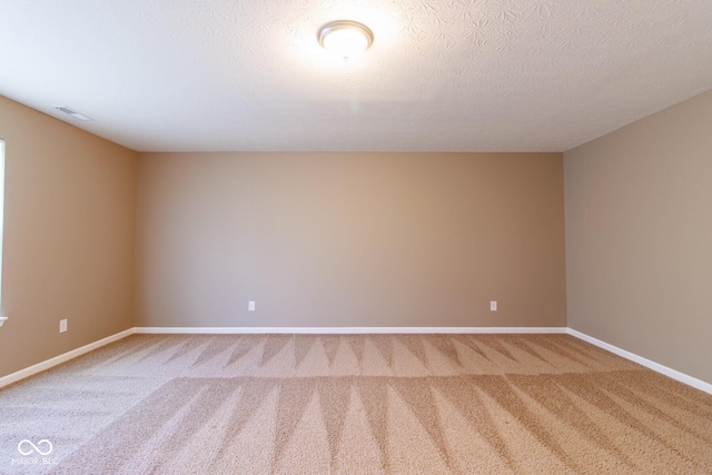 6610 Aberdeen Dr, Mccordsville, IN 46055 - empty room featuring carpet flooring and a textured ceiling