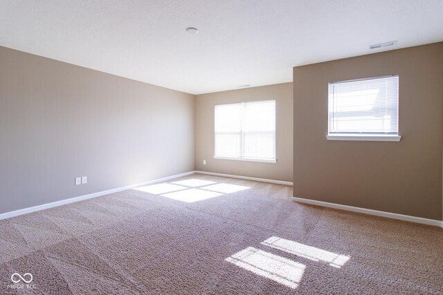 6610 Aberdeen Dr, Mccordsville, IN 46055 - spare room featuring carpet floors and baseboards