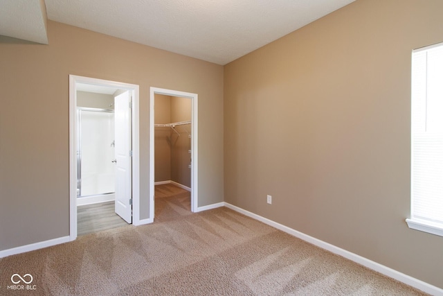 6610 Aberdeen Dr, Mccordsville, IN 46055 - unfurnished bedroom with carpet, a spacious closet, a closet, and ensuite bath