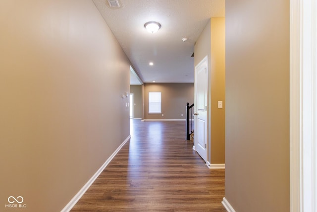 6610 Aberdeen Dr, Mccordsville, IN 46055 - hallway featuring dark wood-type flooring and a textured ceiling