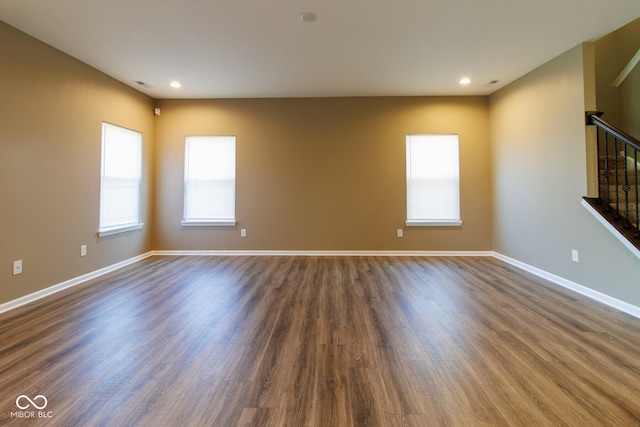6610 Aberdeen Dr, Mccordsville, IN 46055 - spare room with stairway, dark wood-style floors, and recessed lighting