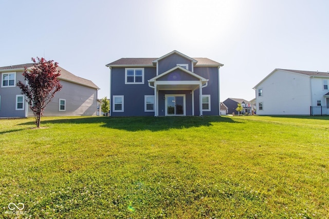 6610 Aberdeen Dr, Mccordsville, IN 46055 - rear view of property featuring a lawn
