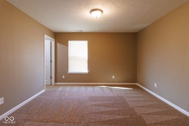 6610 Aberdeen Dr, Mccordsville, IN 46055 - carpeted spare room featuring a textured ceiling and baseboards