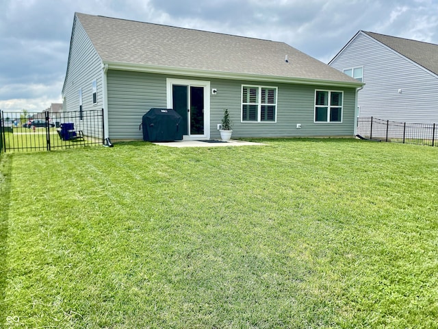 213 Drewood Dr, Trafalgar, IN 46181 - rear view of house featuring a fenced backyard and a shingled roof
