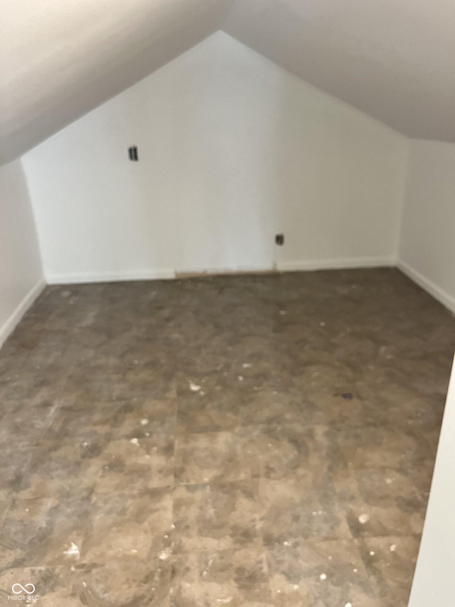 3201 W 22nd St, Indianapolis, IN 46222 - additional living space featuring lofted ceiling and baseboards