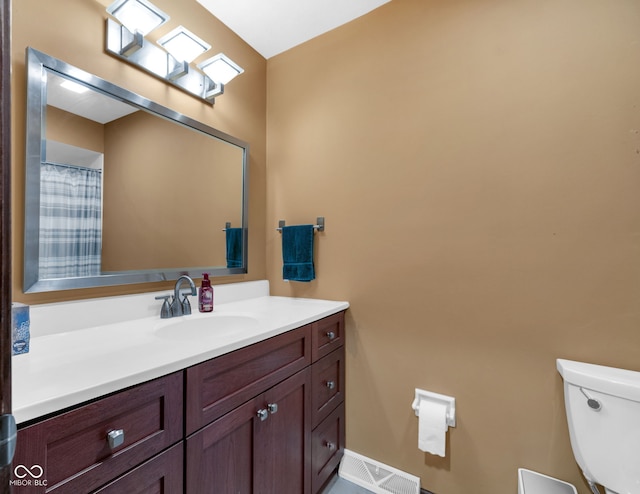 8525 Winding Ridge Rd, Indianapolis, IN 46217 - bathroom with toilet and vanity