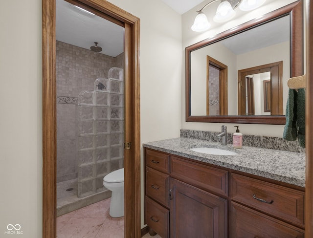 8525 Winding Ridge Rd, Indianapolis, IN 46217 - full bathroom featuring vanity, a tile shower, and tile patterned flooring