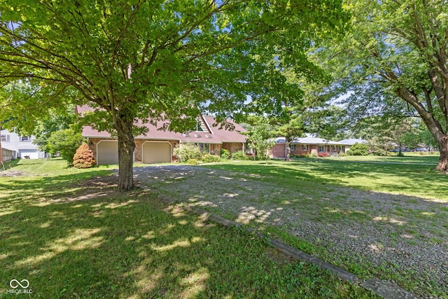 396 W 500 S, Anderson, IN 46013 - view of grassy yard with a garage