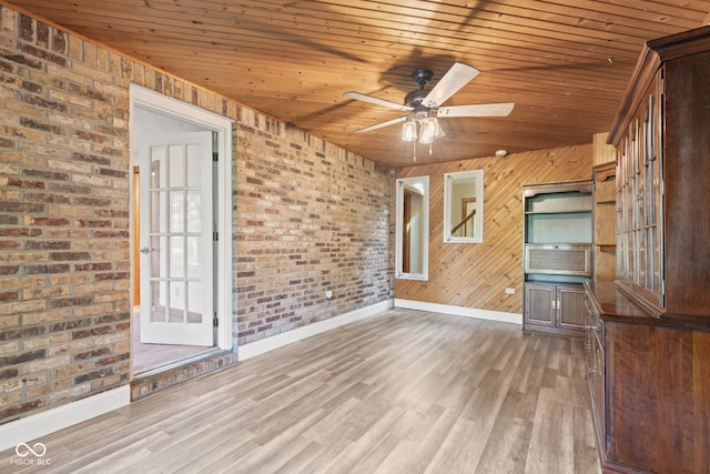 396 W 500 S, Anderson, IN 46013 - unfurnished room with wood ceiling, a ceiling fan, brick wall, and wood finished floors