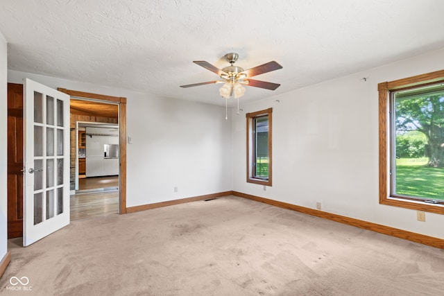 396 W 500 S, Anderson, IN 46013 - carpeted empty room featuring a ceiling fan and a textured ceiling