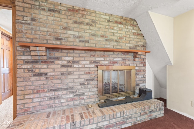 396 W 500 S, Anderson, IN 46013 - detailed view of carpet floors, a brick fireplace, and a textured ceiling
