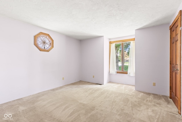 396 W 500 S, Anderson, IN 46013 - spare room with light carpet and a textured ceiling