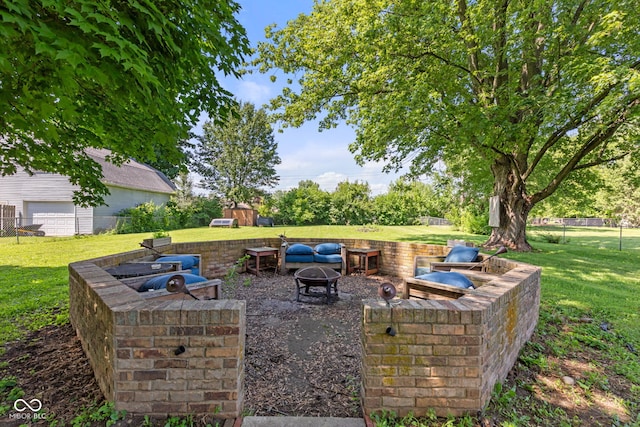 396 W 500 S, Anderson, IN 46013 - view of patio / terrace featuring an outdoor fire pit and a storage unit