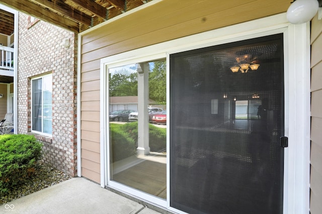 5003 Opal Ridge Ln Unit 101, Indianapolis, IN 46237 - view of exterior entry featuring brick siding