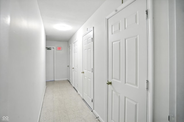 5003 Opal Ridge Ln Unit 101, Indianapolis, IN 46237 - hall with light floors and baseboards