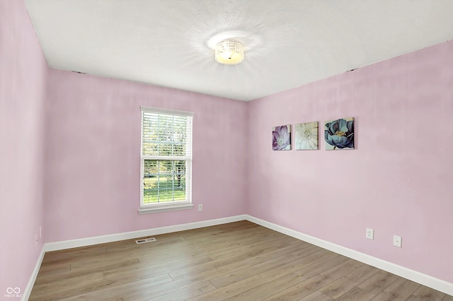 3345 Kilkenny Cir, Carmel, IN 46032 - unfurnished room featuring wood finished floors and baseboards