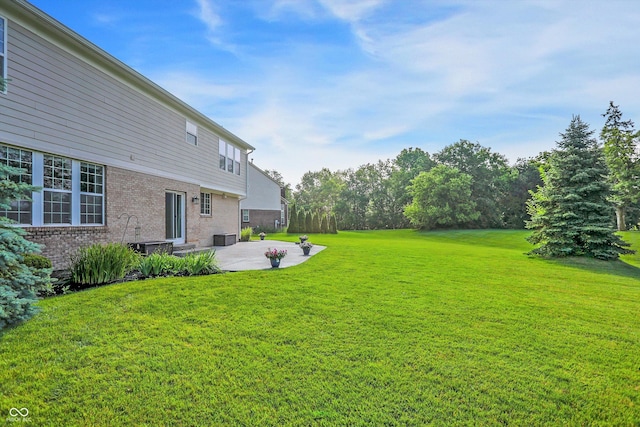 3345 Kilkenny Cir, Carmel, IN 46032 - view of green lawn with a patio area