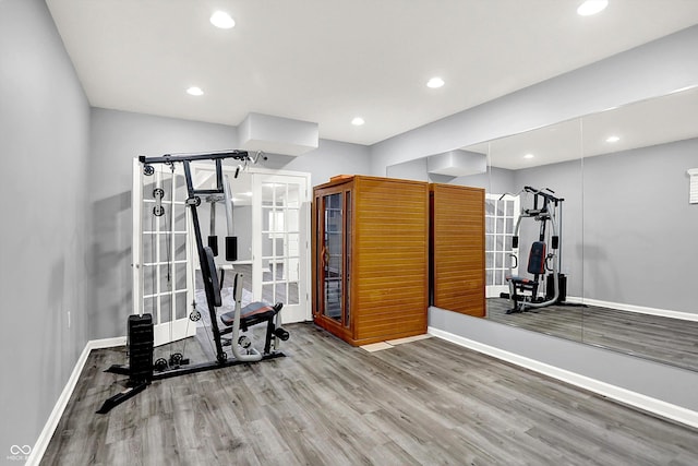 3345 Kilkenny Cir, Carmel, IN 46032 - workout area with wood finished floors and recessed lighting