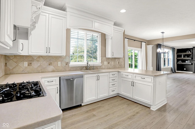 3345 Kilkenny Cir, Carmel, IN 46032 - kitchen with stainless steel dishwasher, a peninsula, healthy amount of natural light, light countertops, and recessed lighting